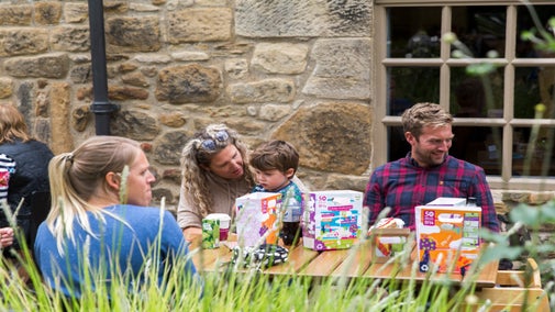 Visitors outside the Brewhouse cafe at Seaton Delaval Hall, Tyne and Wear
